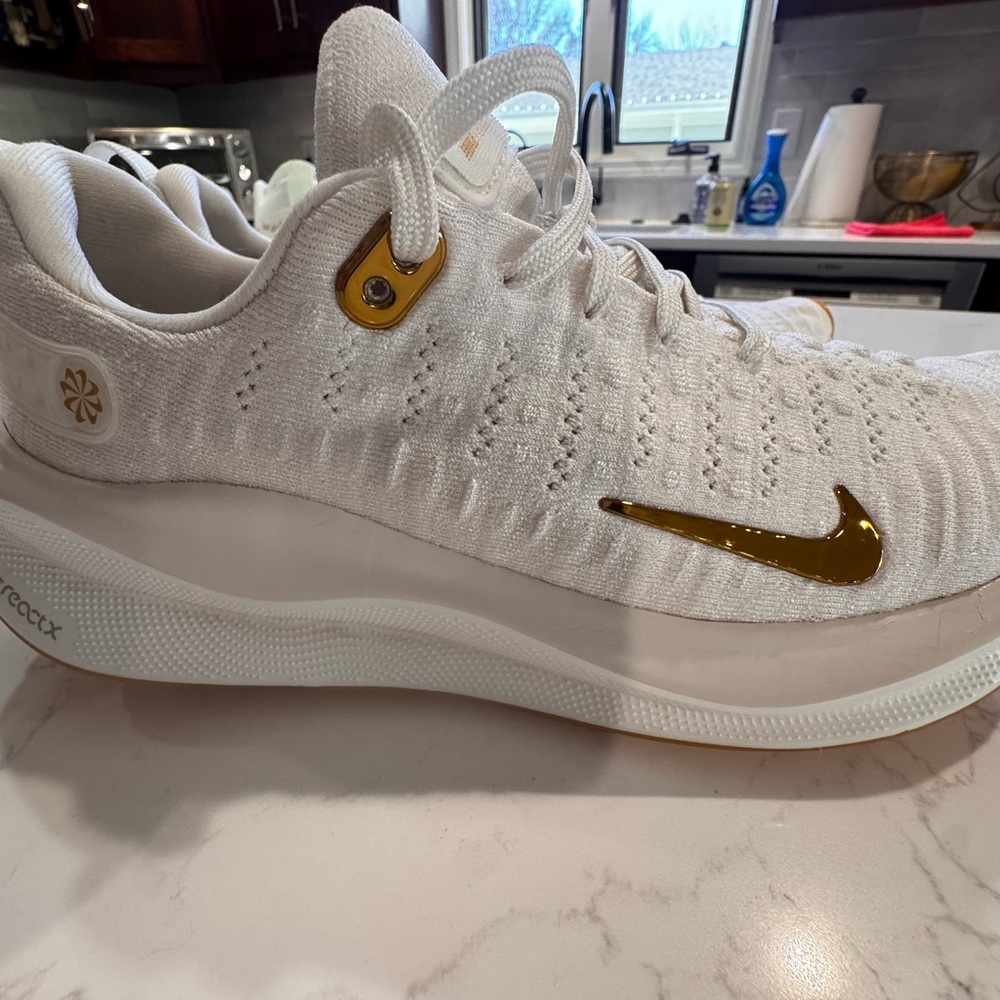 Nike Infinity Run White with Gold Accents